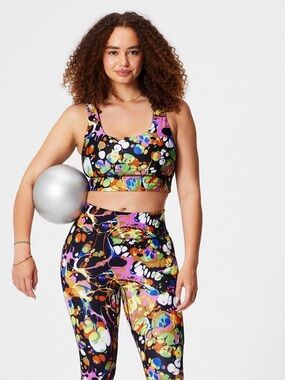 🆕NWT Fabletics Reversible Sports Bra colorful, abstract paint-splatter design M